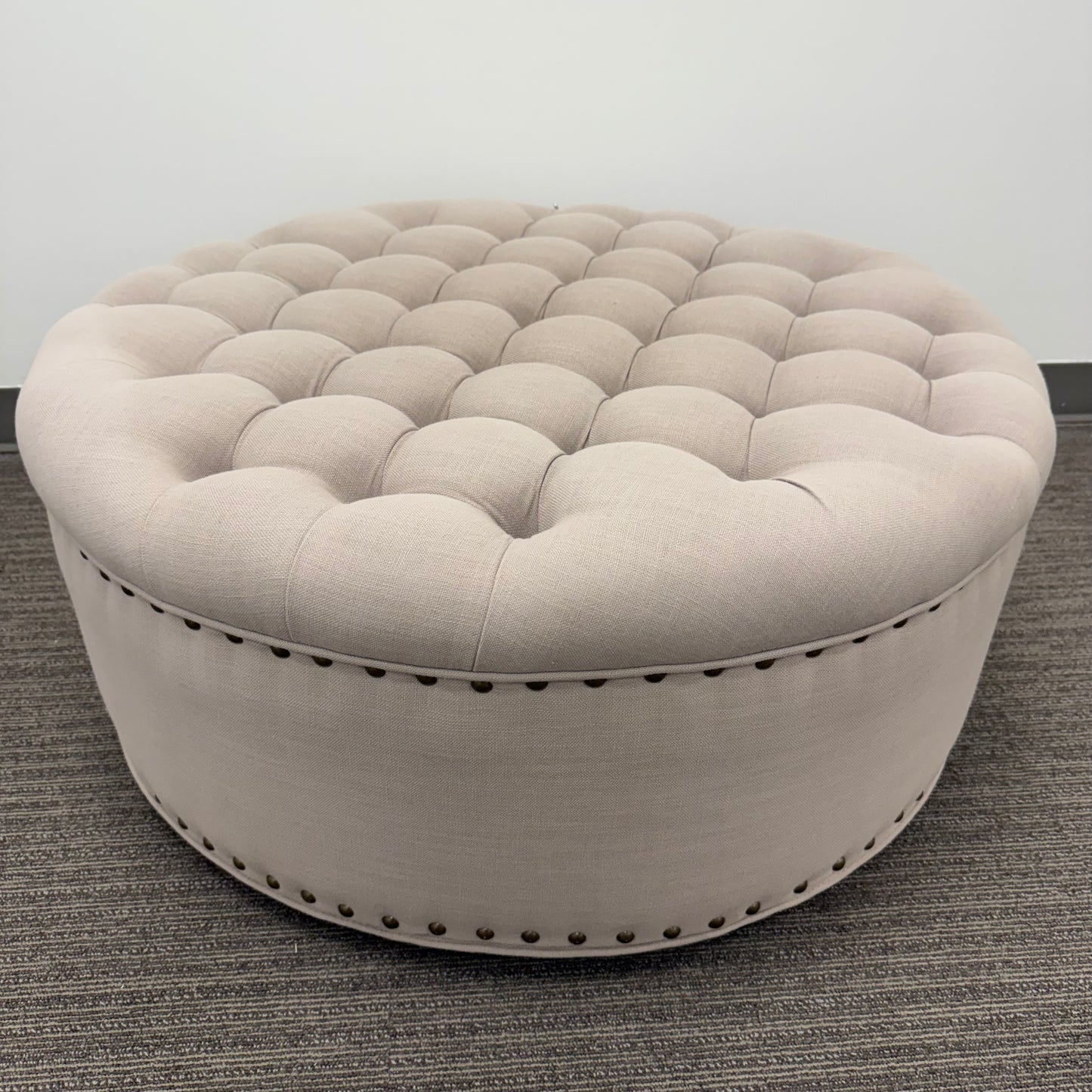 Round Tufted Ottoman with Nail Head Trim