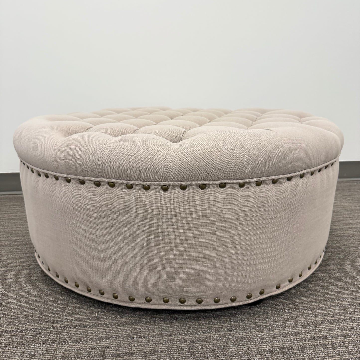 Round Tufted Ottoman with Nail Head Trim